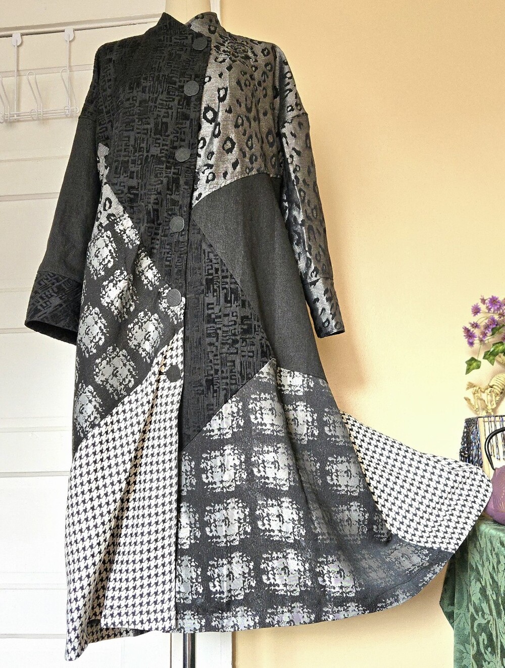 Oopera multi-pattern black and white patchwork button up trench coat; pockets